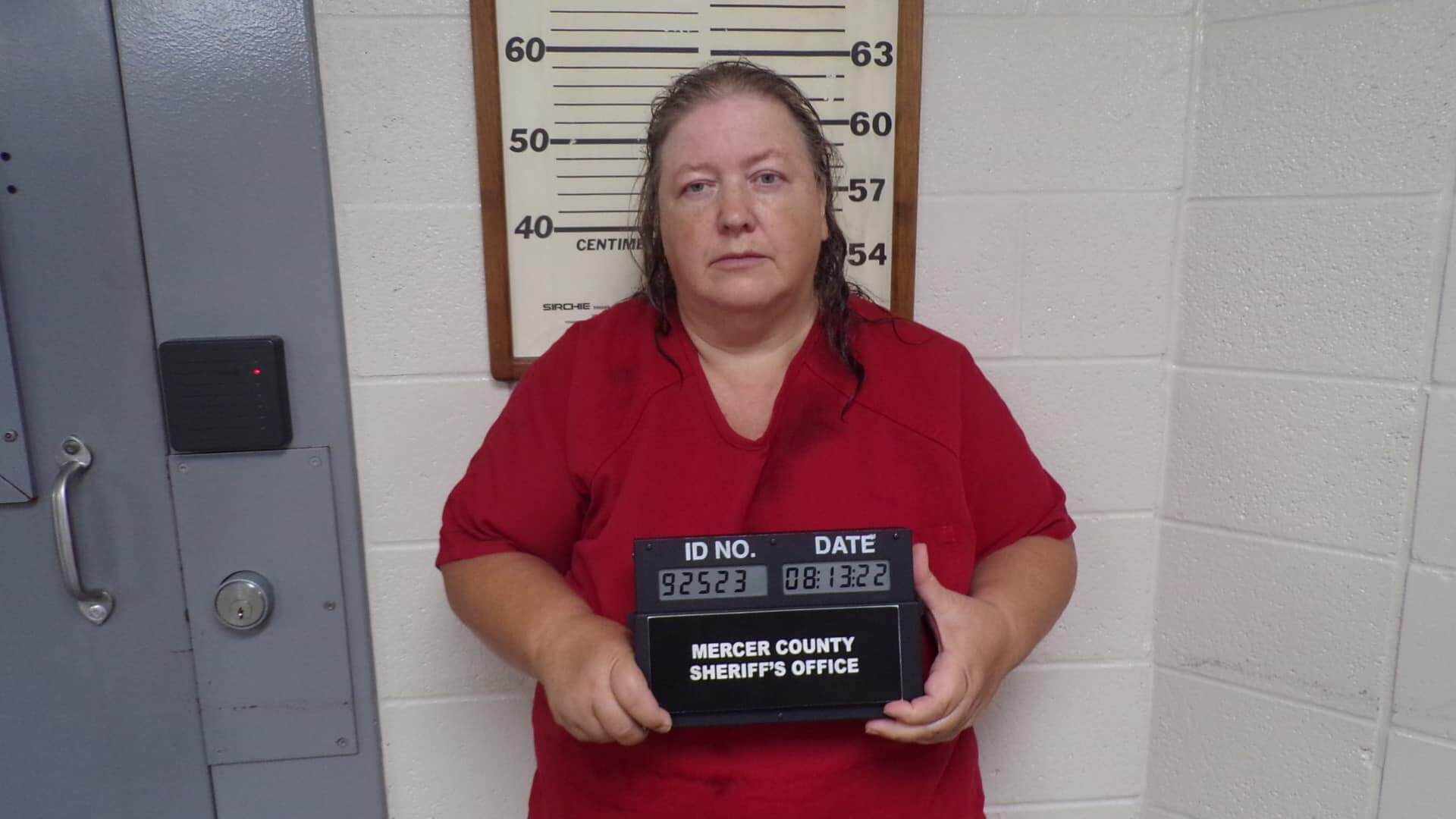 Woman arrested after nearly 200 neglected dogs found on property