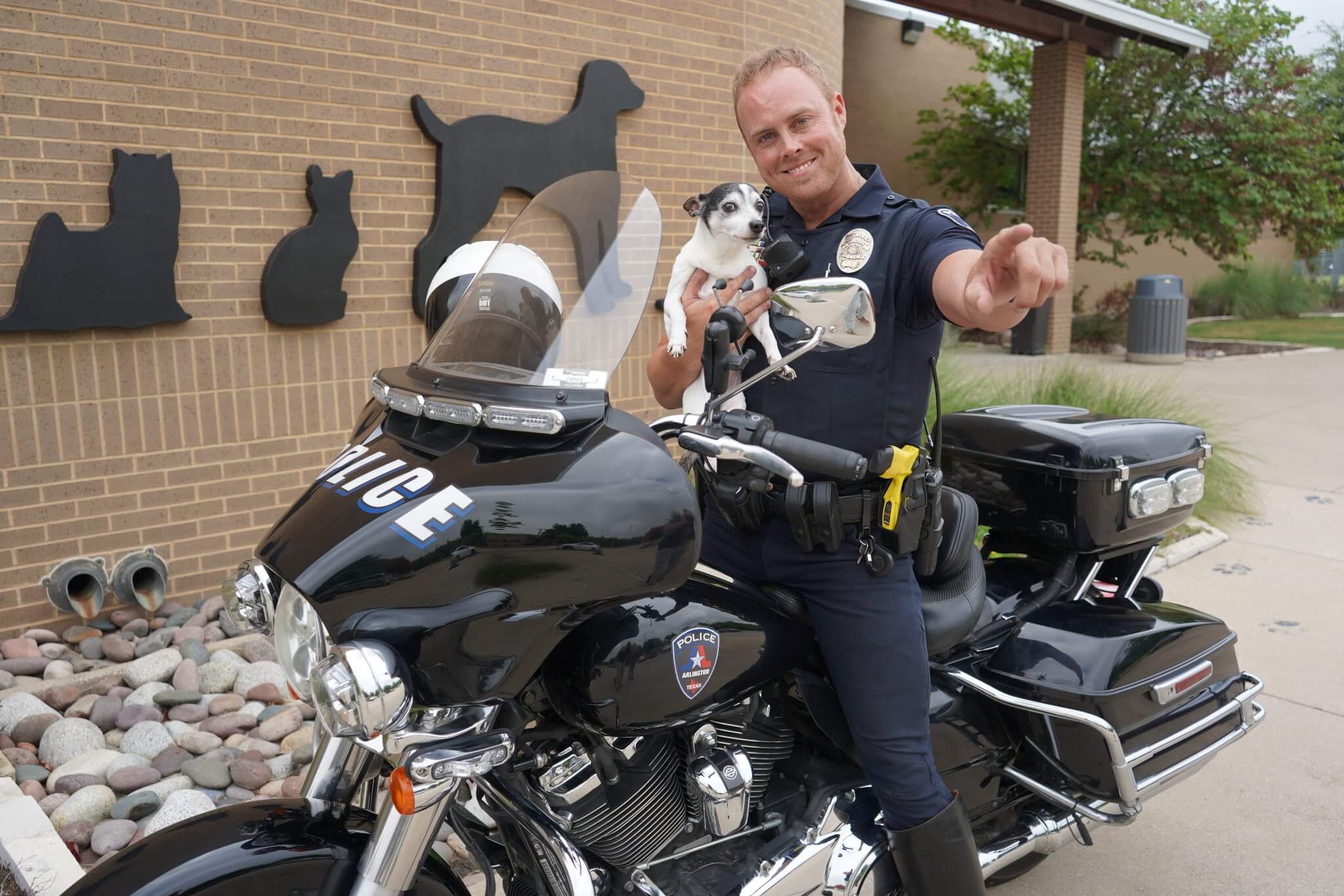 Cool motorcycle cop does ‘rock n roll’ photo shoot with shelter pup Elvis who then finds his loving home