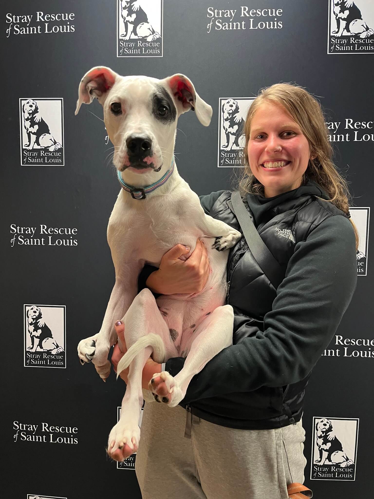 Puppy born with a fifth paw returns to Stray Rescue for visit and wow is she happy