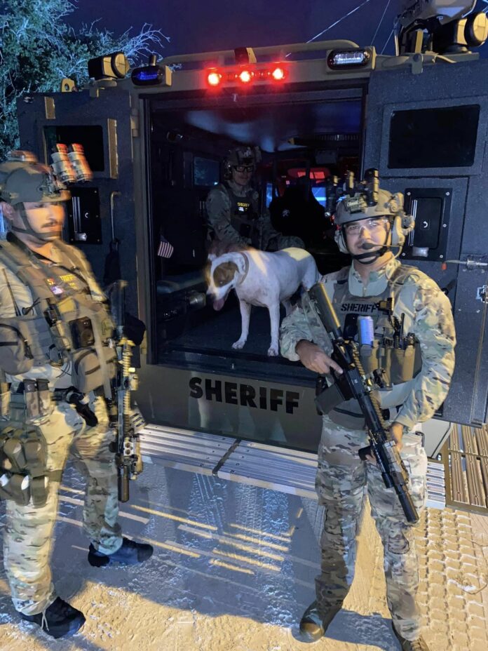 Heartwarming: Early morning SWAT warrant meets friendliest pup jump into armored truck