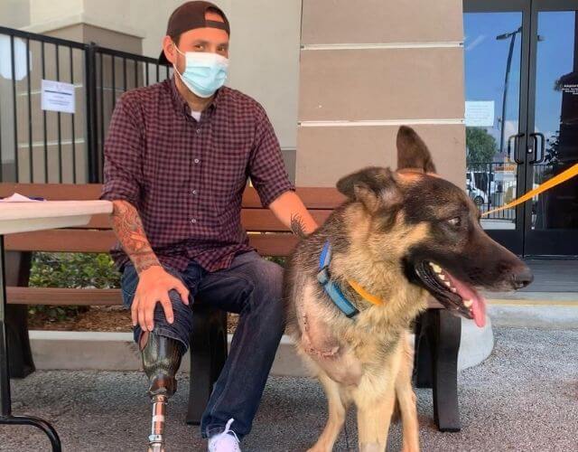 Veteran who lost his leg during deployment adopts three-legged dog and melts Internet hearts
