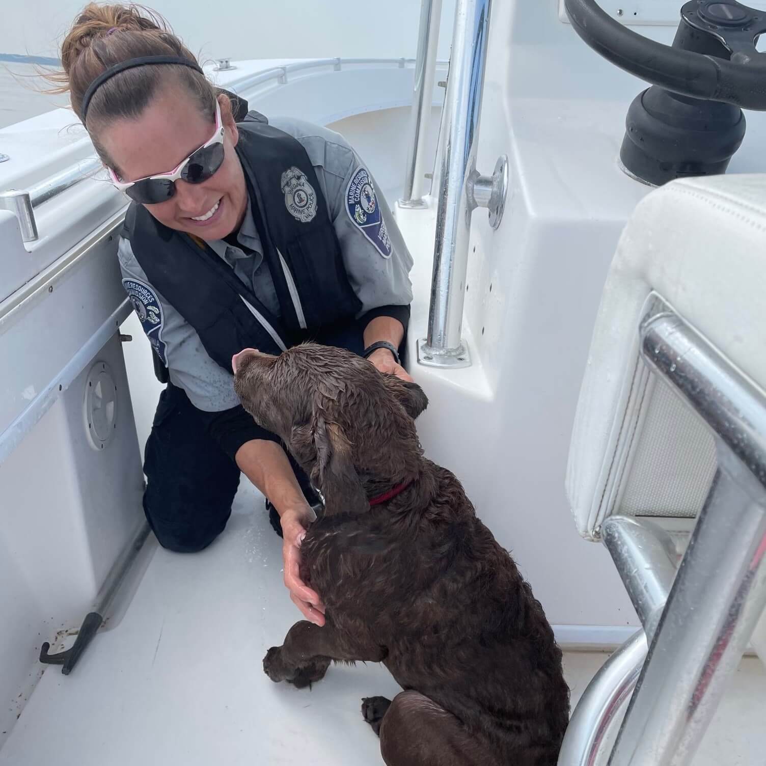 Puppy who doggy paddled for nearly 2 hours swept away by strong current rescued by marine police